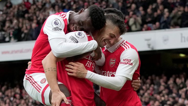 Arsenal players celebrate after Granit Xhaka&#39;s goal gives them a 4-1 advantage against Leeds