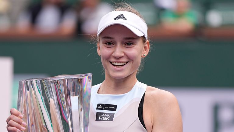 Elena Rybakina, of Kazakhstan, holds up the winner&#39;s trophy after defeating Aryna Sabalenka, of Belarus, in the women&#39;s singles final at the BNP Paribas Open tennis tournament Sunday, March 19, 2023, in Indian Wells, Calif. (AP Photo/Mark J. Terrill)